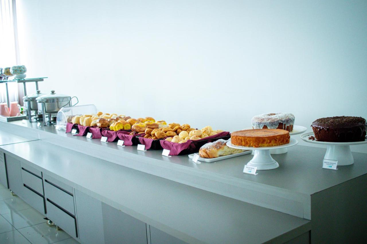 Hotel H2 Congonhas Экстерьер фото A selection of cakes