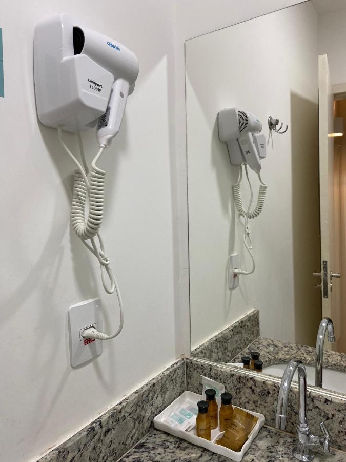 Hotel H2 Congonhas Экстерьер фото A hair dryer in a hotel room